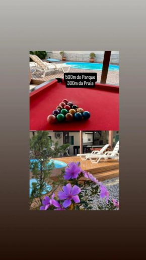 CASA DE PRAIA TOP! A 500m do Parque Beto Carrero, a 300m da Praia de Armacao, com piscina e sinuca, 3 quartos, churrasqueira e estacionamento privado